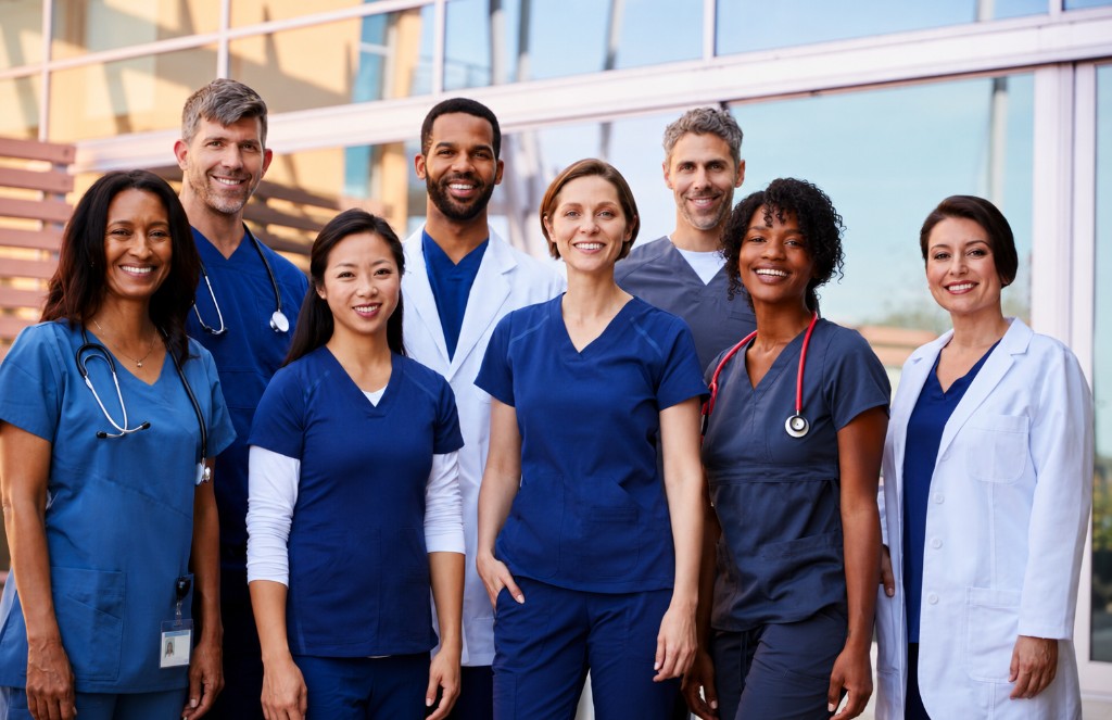Diverse women's health clinical team standing together